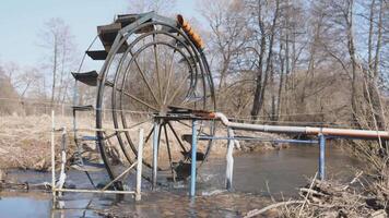 old technology of water supply for irrigation of agricultural fields 4k video