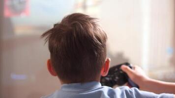 Boy Playing Game in Game Console. Kid Gambling Addiction. video