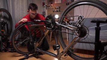 Caucasian male cyclist using tablet to browse for equipment to repair bicycle video