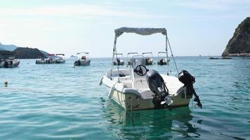 Greece Corfu island 05.03.2024 boat tour near Corfu island attractions deep clean clear water mountains natural spring passing boat people tourists and travelers video