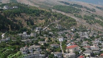 Gjirokaster Albania 05.03.2024 Fortress in Gjirokastra a huge stone building on a high mountain clock the history of the Middle Ages a beautiful view from the stone city to the ancient village video