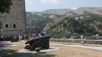 Gjirokaster Albania 05.03.2024 Fortress in Gjirokastra a huge stone building on a high mountain clock the history of the Middle Ages a beautiful view from the stone city to the ancient village video