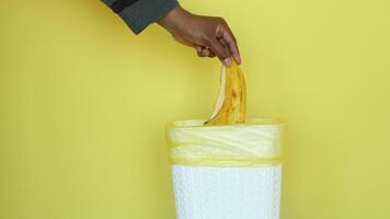 throwing banana in a garbage bin video