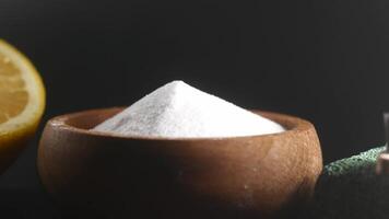 Baking soda and whole lemon on table video