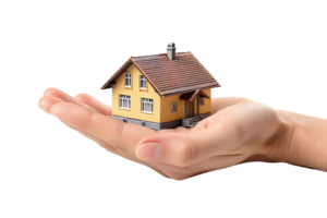 Hand holding a small simple house on isolated transparent background png