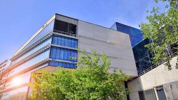 Architectural facade building with of glass elements. Exterior of a modern industrial building. photo