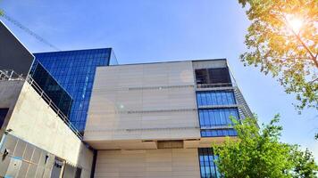 Architectural facade building with of glass elements. Exterior of a modern industrial building. photo