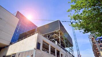 Architectural facade building with of glass elements. Exterior of a modern industrial building. photo