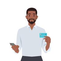Smiling man holds smart phone and credit card. vector