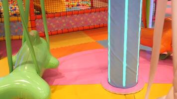 indoor swings in colorful playground video