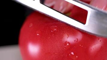 Slicing a beautiful, appetizing red tomato. video