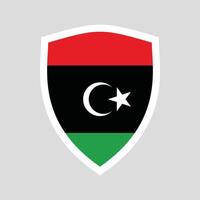 Libya Flag in Shield Shape Frame vector