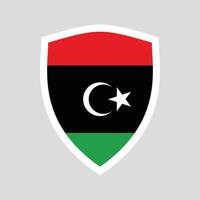 Libya Flag in Shield Shape Frame vector