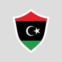 Libya Flag in Shield Shape Frame vector