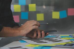 ux Graphic designer creative sketch planning application process development prototype wireframe for web mobile phone . User experience concept. photo