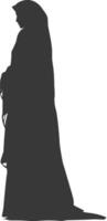 Silhouette independent emirates women wearing Abaya black color only vector