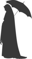 Silhouette independent emirates women wearing Abaya with umbrella black color only vector