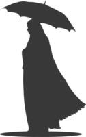 Silhouette independent emirates women wearing Abaya with umbrella black color only vector