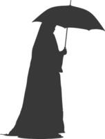 Silhouette independent emirates women wearing Abaya with umbrella black color only vector