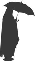 Silhouette independent emirates women wearing Abaya with umbrella black color only vector