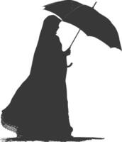 Silhouette independent emirates women wearing Abaya with umbrella black color only vector