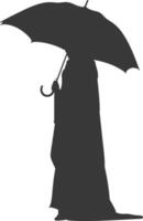 Silhouette independent emirates women wearing Abaya with umbrella black color only vector