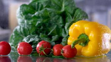 Closeup on vegetables on cutting board and young housewife in background Assortment of fresh vegetables at market video