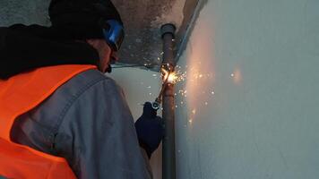 Construction Worker Welding Pipe at Site video