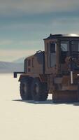 road grading machine on the salt desert road video