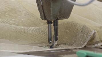 Tailor Sews Fabric on Machine video