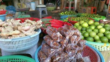 Vegetable stall at local outdoor farmers market in Vietnam. Close-up video