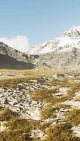 Stones covered with grass and moss under bright sky of Nepal video