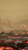 volcanic eruption with fresh hot lava flames and gases going out from the crater video