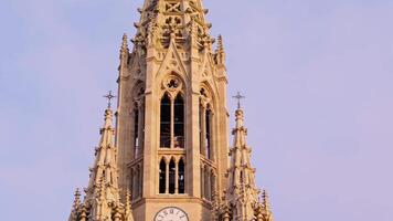 Majestic clock tower with four clocks video