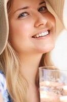 Fashion, travel and beauty face portrait of young woman, beautiful model wearing beach sun hat in summer, head accessory and style photo