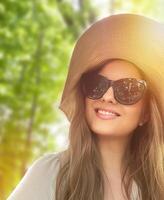 Beauty, summer holiday and fashion, face portrait of happy woman wearing hat and sunglasses, for skincare cosmetics, sunscreen spf lifestyle look photo