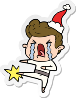 hand drawn sticker cartoon of a crying man wearing santa hat png