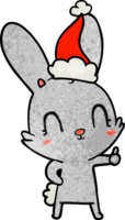 mignon dessin animé texturé d'un lapin portant un bonnet de noel png