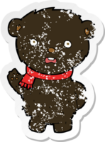 autocollant rétro en détresse d'un ours noir de dessin animé portant une écharpe png