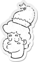 distressed sticker of a cartoon man wearing christmas hat png