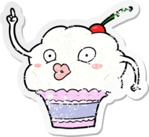 distressed sticker of a cartoon cupcake png