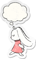 lapin de dessin animé mignon et bulle de pensée comme un autocollant usé en détresse png