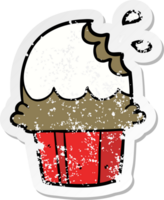 distressed sticker of a cartoon cupcake png