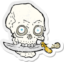 retro distressed sticker of a cartoon pirate skull with knife in teeth png