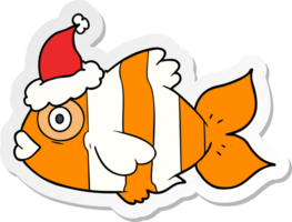 hand drawn sticker cartoon of a exotic fish wearing santa hat png