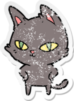 distressed sticker of a cartoon cat with bright eyes png