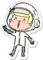 distressed sticker of a happy cartoon astronaut giving peace sign png