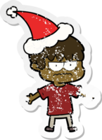 agacé main tiré affligé autocollant dessin animé de une garçon portant Père Noël chapeau png