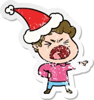 hand drawn distressed sticker cartoon of a furious man wearing santa hat png