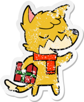 distressed sticker of a friendly cartoon fox with christmas present png